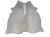 Naturalna skóra bydlęca BEŻOWO-BIAŁA 150x130 cm rozłożona w dużym salonie  - dekoracyjneskory.pl