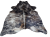 Naturalna skóra bydlęca TYGRYS BRĄZOWO-BEŻOWY 140x130 cm rozłożona w dużym salonie  - dekoracyjneskory.pl